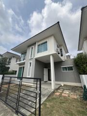 Contemporary two-story house with front yard