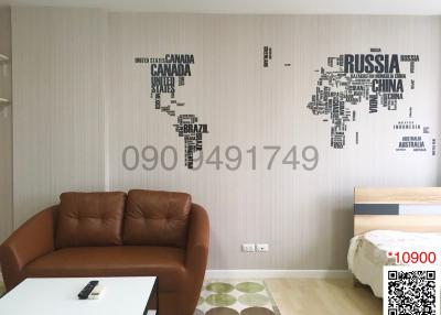 Stylish living room with world map wall decor and modern furniture