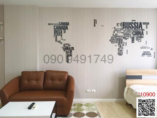 Stylish living room with world map wall decor and modern furniture