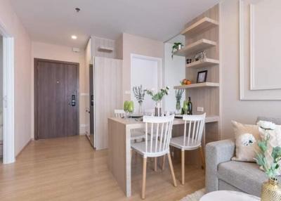 Contemporary apartment dining area with adjacent living space