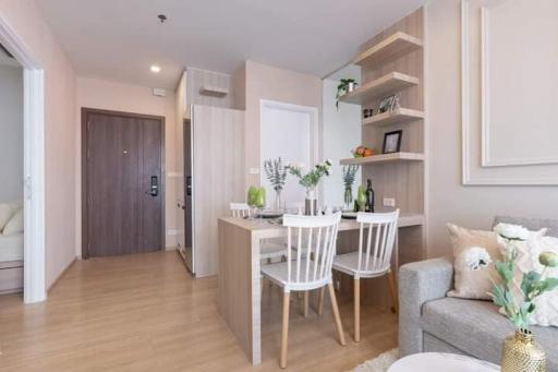 Contemporary apartment dining area with adjacent living space