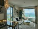 Luxurious living room with ocean view, modern furnishings, and open-concept design