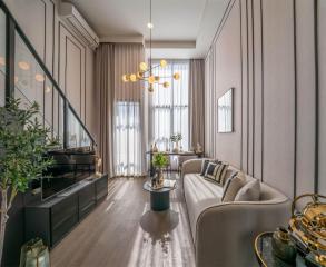 Modern living room with elegant decor and natural light