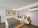 Modern Bedroom with Elegant Decor and Ample Lighting