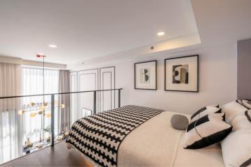 Modern bedroom with mezzanine and stylish interior design