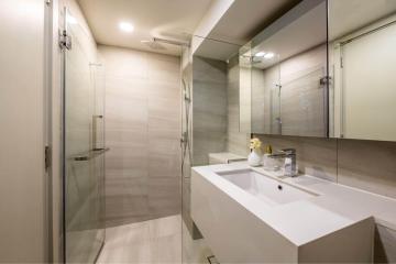 Modern bathroom with walk-in shower and vanity