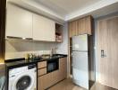 Modern kitchen with appliances and ample cupboard space