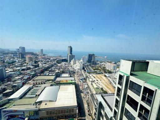 Panoramic cityscape view from high-rise building window