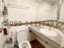 Spacious white-themed bathroom with tiled flooring