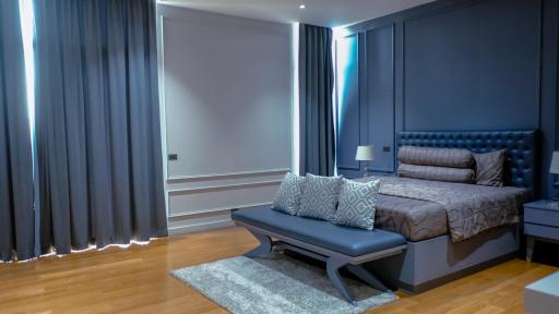 Modern bedroom with king-size bed and elegant interior design