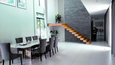 Modern living space with dining area and staircase