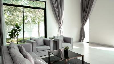 Modern living room with large windows and natural light