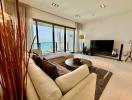 Spacious living room with ocean view and ample natural light