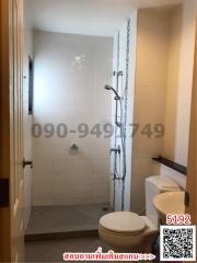 Modern bathroom interior with shower and toilet