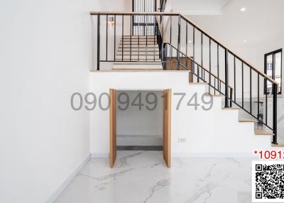 Modern staircase in a bright, clean interior
