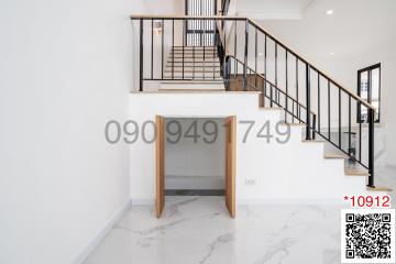 Modern staircase in a bright, clean interior