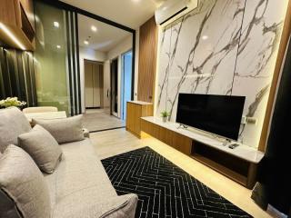 Modern living room with stylish design and marble wall