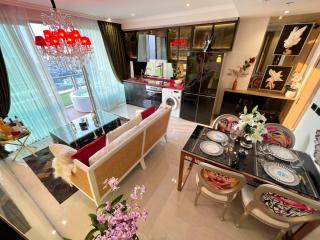 Modern dining and kitchen area with balcony access
