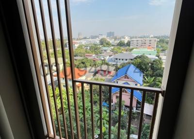 High-rise balcony view overlooking residential area