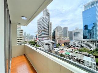 City view from a high-rise balcony