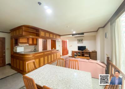 Spacious kitchen with modern appliances and a dining area