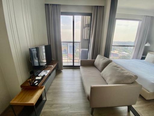 Contemporary living room with city view from the balcony