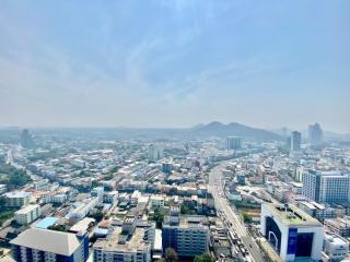 Expansive cityscape view showcasing the urban landscape and skyline under a clear sky