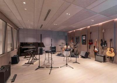 Spacious music room with instruments and modern design