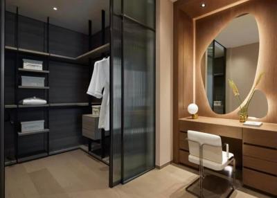 Elegant walk-in closet with custom shelving and integrated lighting