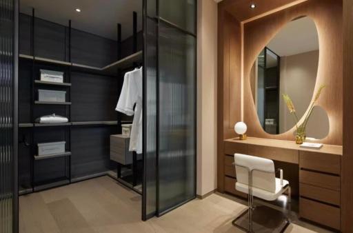 Elegant walk-in closet with custom shelving and integrated lighting