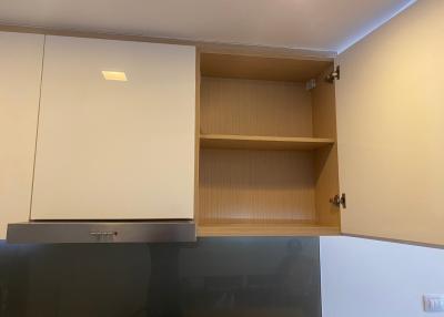 Kitchen cabinet detail showing storage space