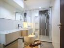 Modern bathroom interior with glass shower cubicle