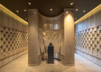 Elegant lobby interior with artistic deer sculpture and wooden design elements