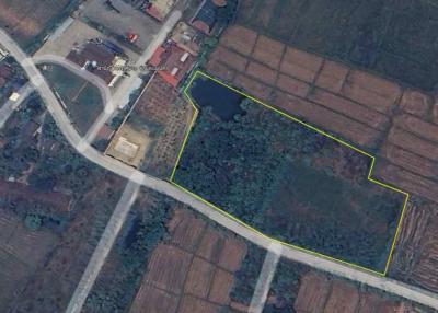10 Rai land in San Kamphaeng, Chiang Mai, Thailand, available for just 2,500,000 baht/rai. Direct access from the main road, 162m wide frontage.