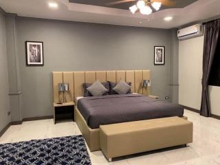 Elegant bedroom with modern furnishings and stylish decor