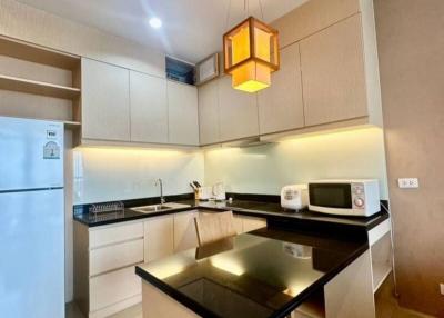 Modern kitchen with stainless steel appliances and ample cabinet space