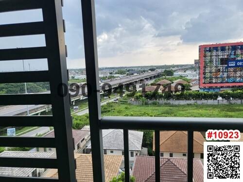 Balcony view overlooking the city with a safety railing