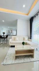 Modern living room interior with white furniture and open concept layout