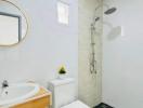 Modern bathroom interior with white walls and dark floor tiles