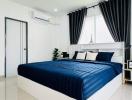 Bright and modern bedroom with a king-sized bed and elegant decor