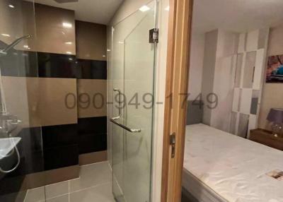 Compact bedroom with adjoining bathroom