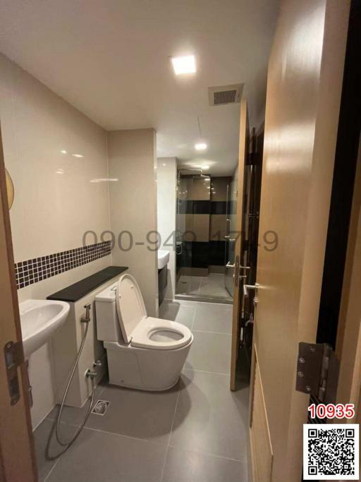 Modern bathroom interior with tiled floor