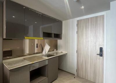 Modern kitchen with integrated appliances and wooden finishes