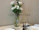 Elegantly set dining table with floral centerpiece