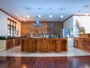 Spacious modern kitchen with central island and wooden cabinets