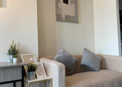 Modern living room with a comfortable sofa and stylish decor