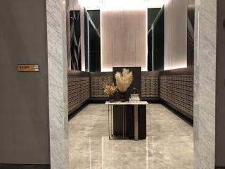Modern building lobby with mailboxes and stylish decor