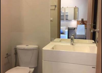 Modern bathroom interior with toilet and sink