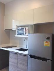 Modern kitchen with stainless steel appliances