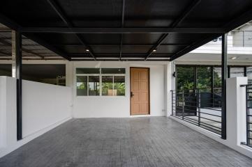 Spacious and clean garage with a tiled floor and ample lighting